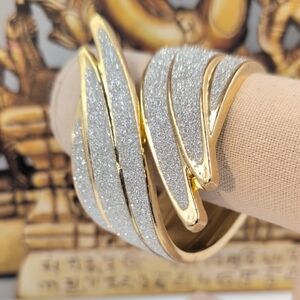 Elegant Gold and Silver Interwoven Hinged Bracelet
